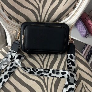 Black Crossbody Bag with Animal Print Strap